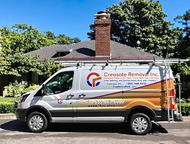 Gilbert Chimney Sweep technician removing creosote safely in Gilbert, AZ
