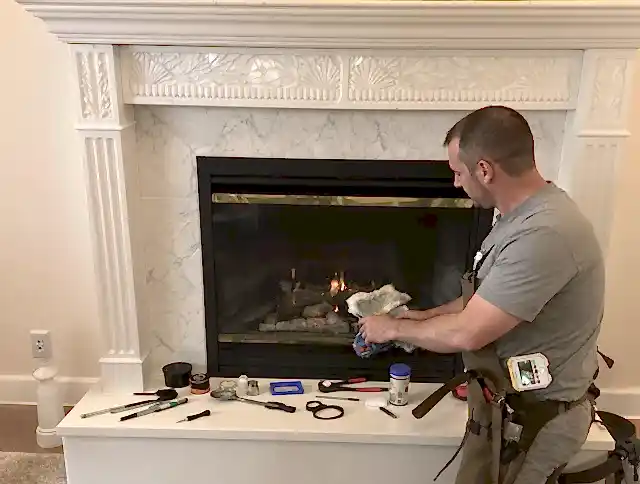 Gilbert Chimney Sweep performing fireplace maintenance in Gilbert, AZ
